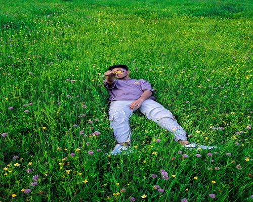 Man resting mindfully in nature